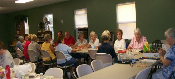 Residents playing bingo in the clubhouse